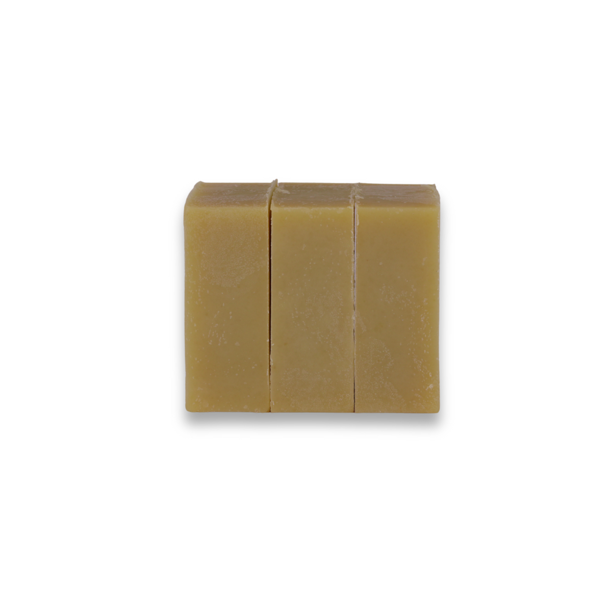 Three bars of soap stacked on a white background