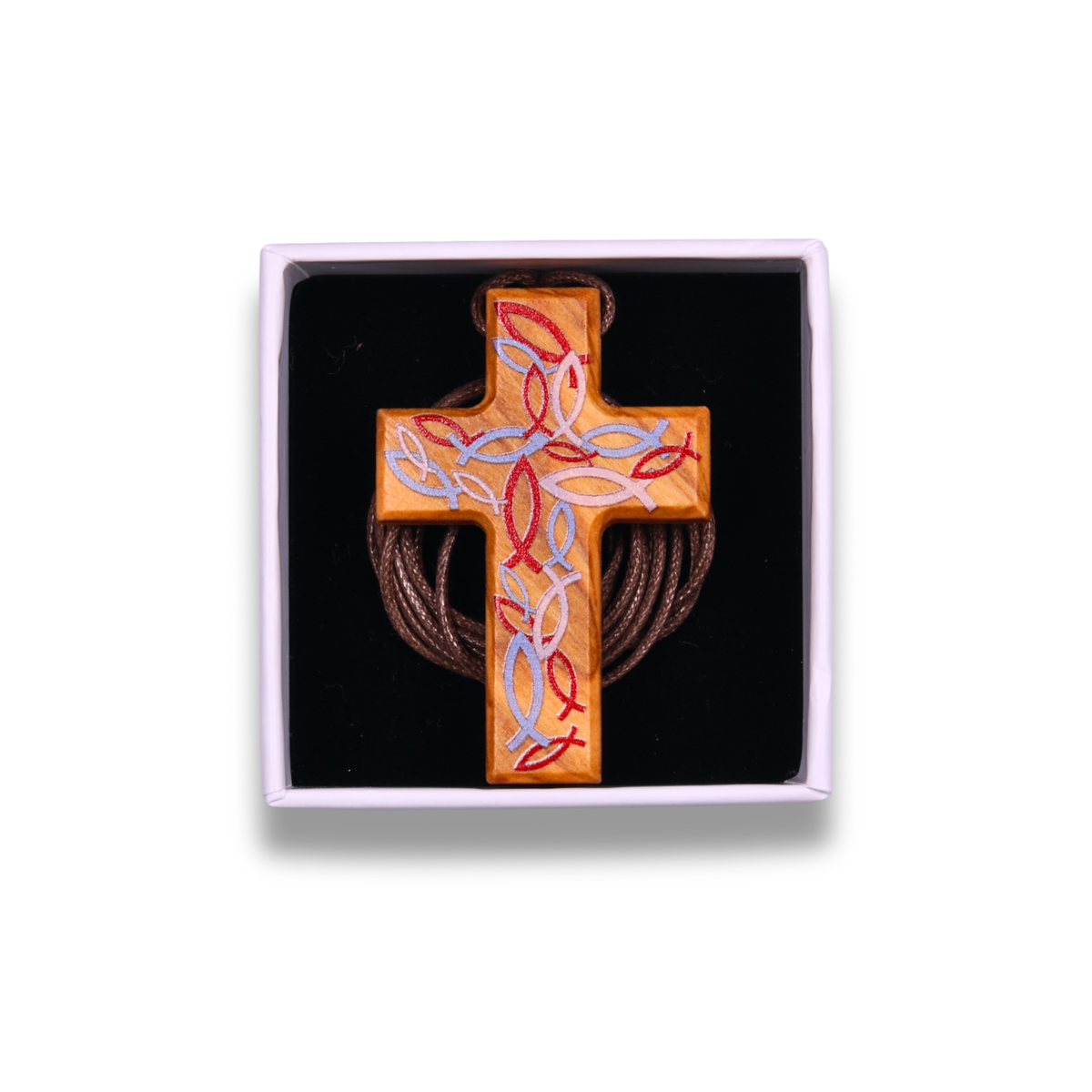 Handcrafted olive wood cross necklace featuring intricate red and light blue Ichthus fish engravings forming a woven pattern on the surface, suspended on a brown cord. In a gift box.