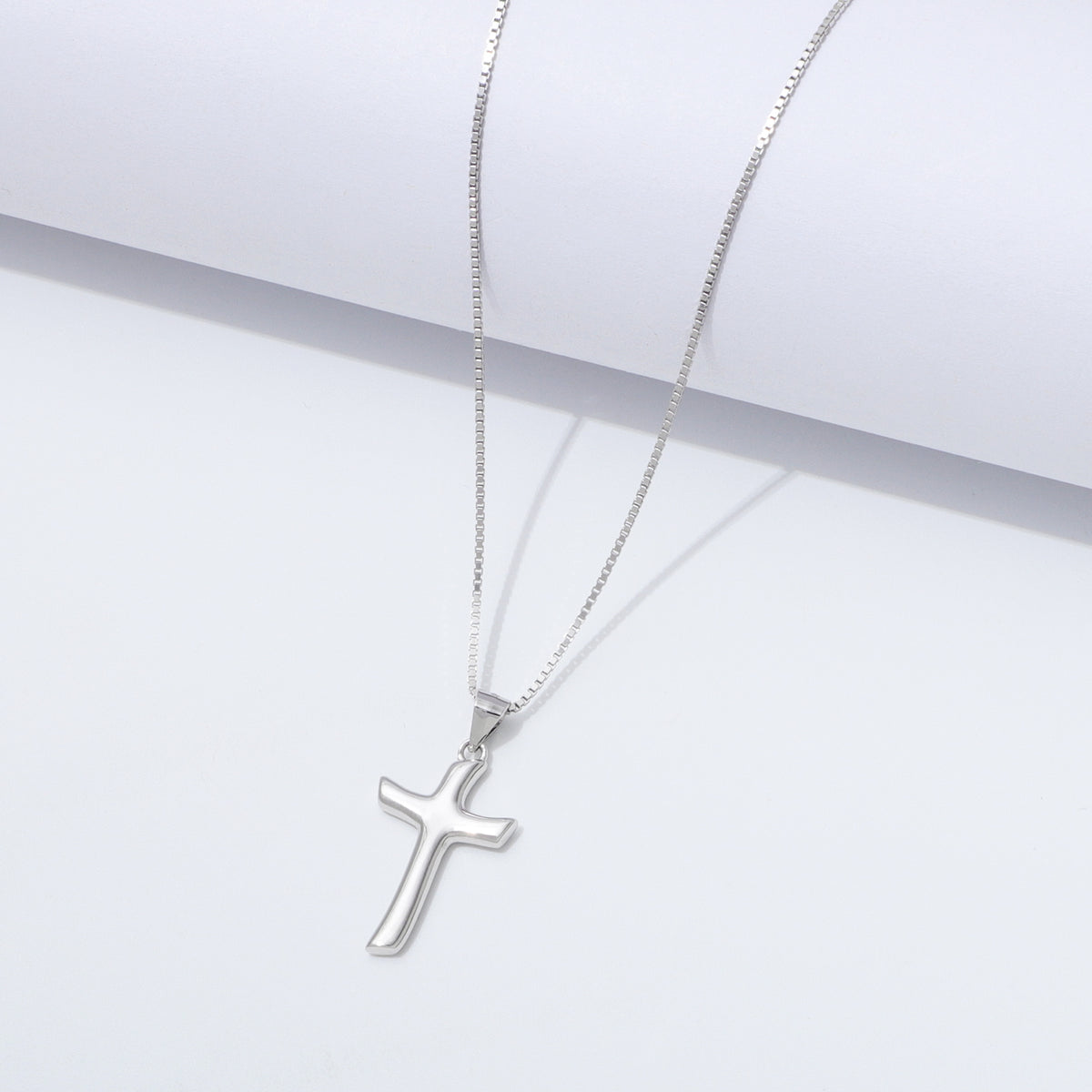 925 Sterling Silver Flow Cross Necklace On a White Background