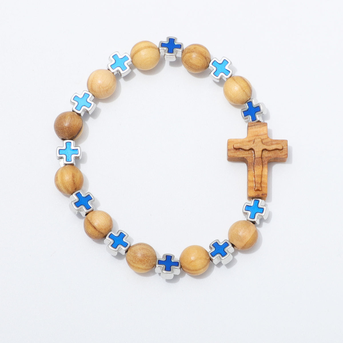 A beaded bracelet featuring natural wood beads, a wooden crucifix, and alternating blue and light blue enamel cross charms set in silver, displayed on a clean white background.