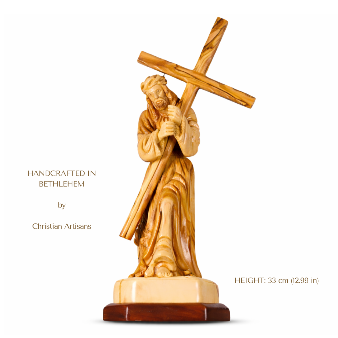 Wooden statue of JESUS carrying a cross, handcrafted in Bethlehem by Christian Artisans.