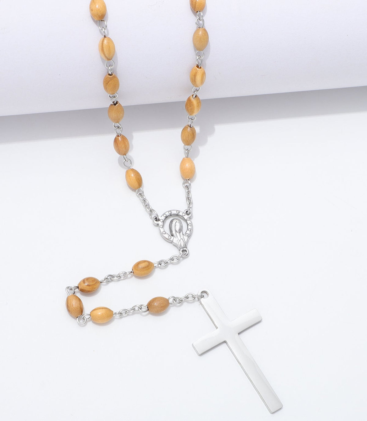 Detail of oval olive wood beads, Virgin Mary centerpiece and polished cross