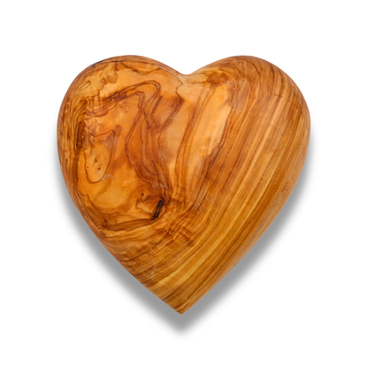 Olive wood heart shape on a white background