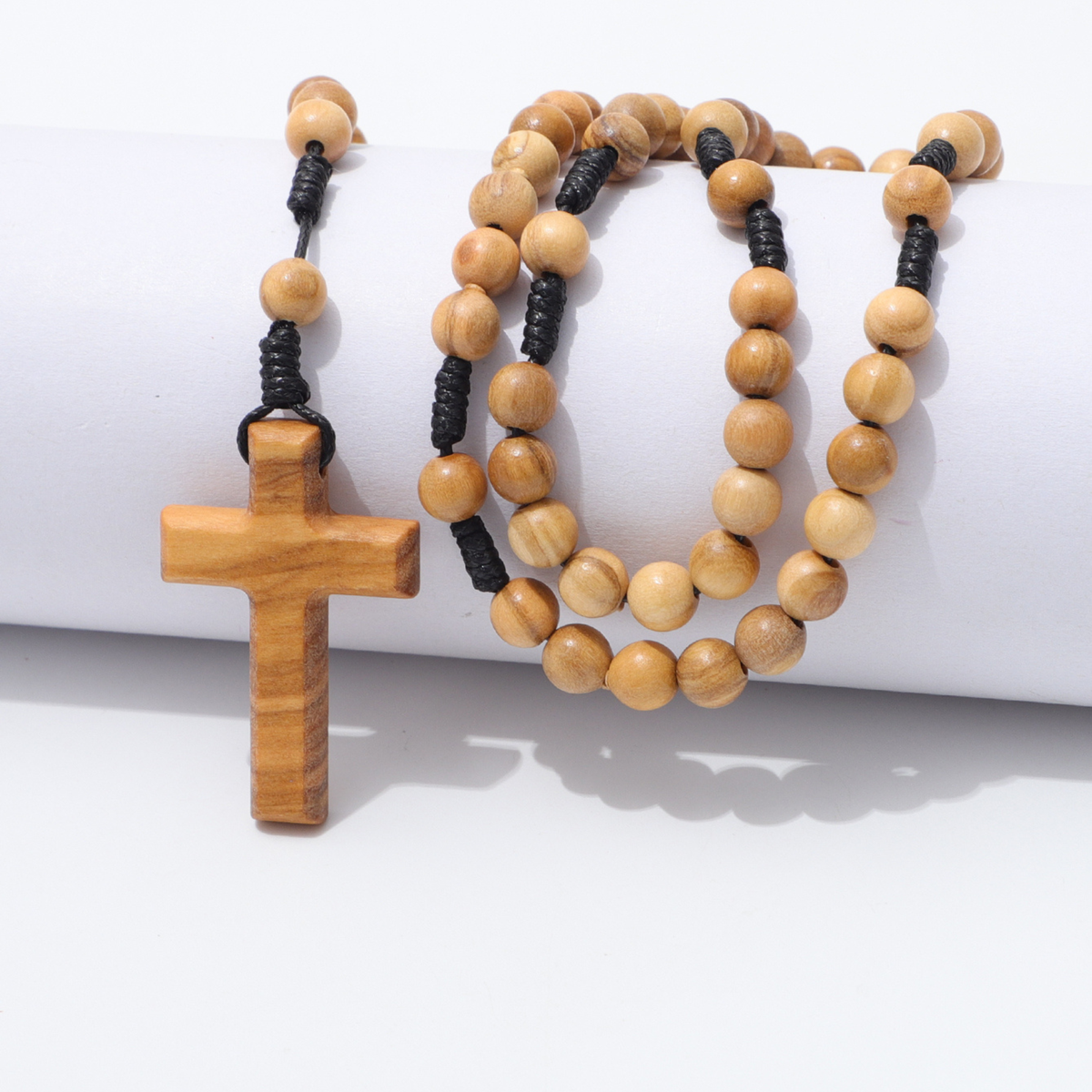 Example of an assembled olive wood rosary on black knotted cord