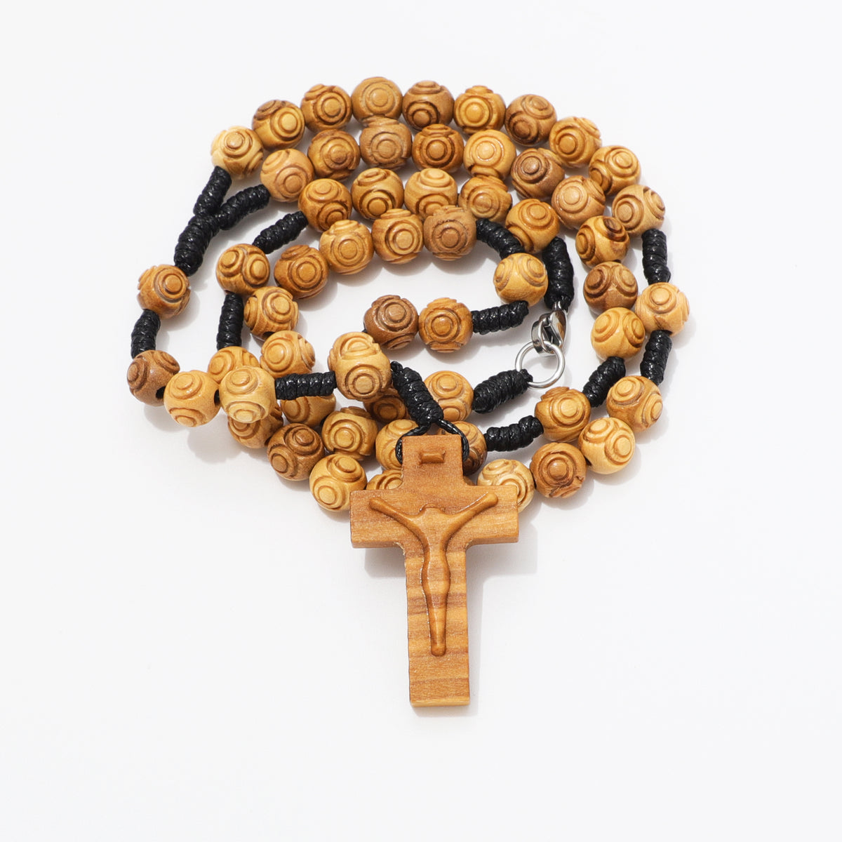 Coiled 8mm engraved olive wood rosary necklace showing the carved crucifix and clasp