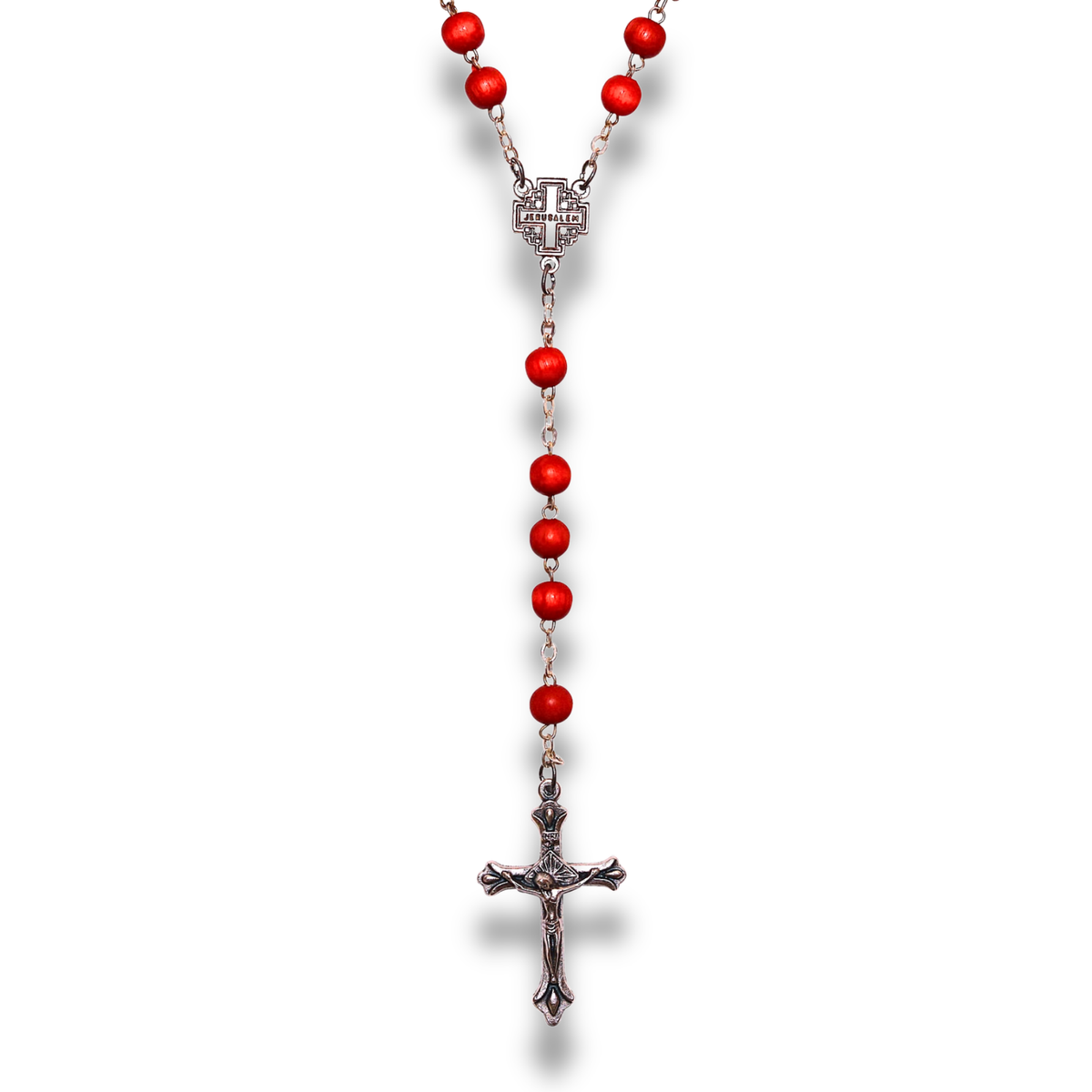 Red rosary beads and silver toned crucifix shown hanging vertically