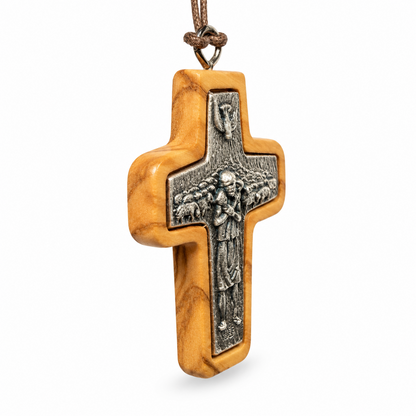 Medium Good Shepherd olive wood cross necklace, 4 × 3 cm, angled view
