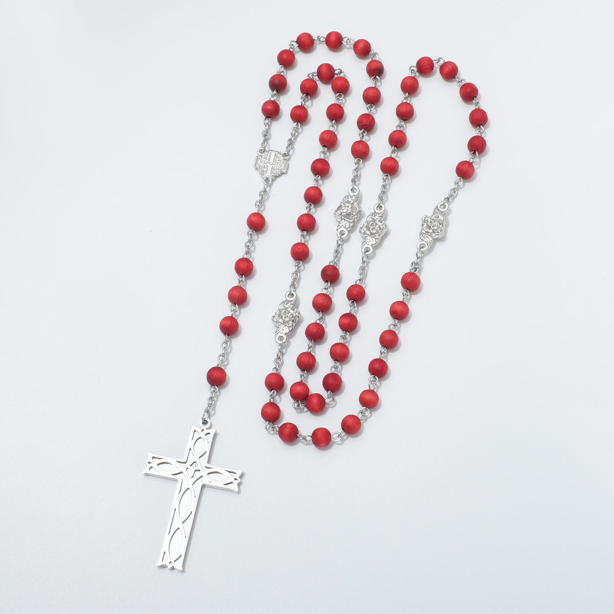 Red bead rosary with Jerusalem Cross centerpiece arranged in long loops