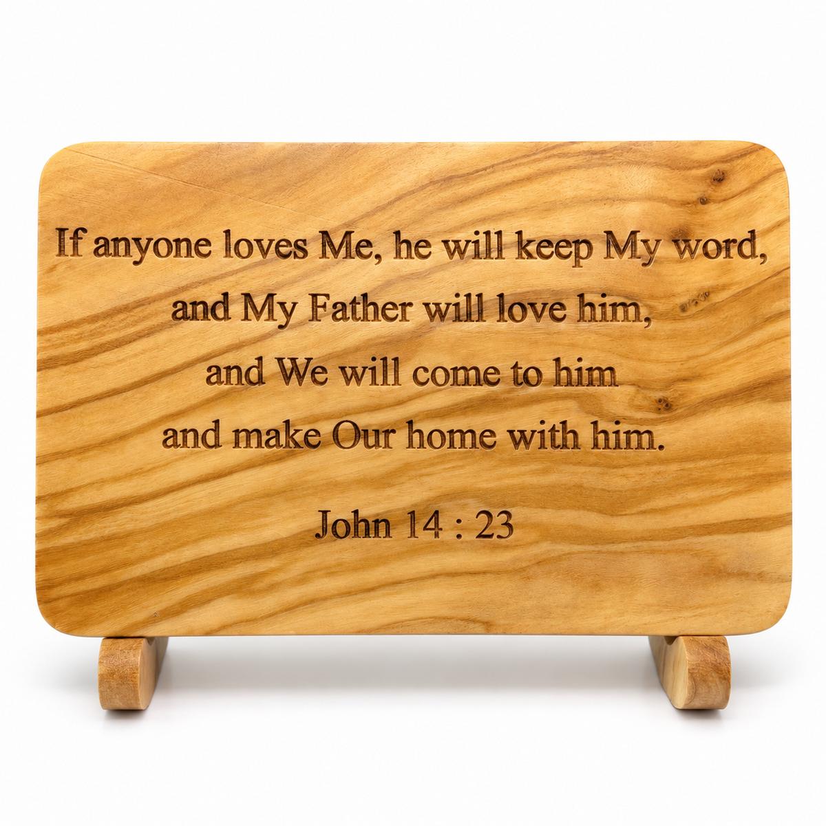 Front view of an olive wood scripture plaque engraved with John 14:23, displayed on a wooden stand.