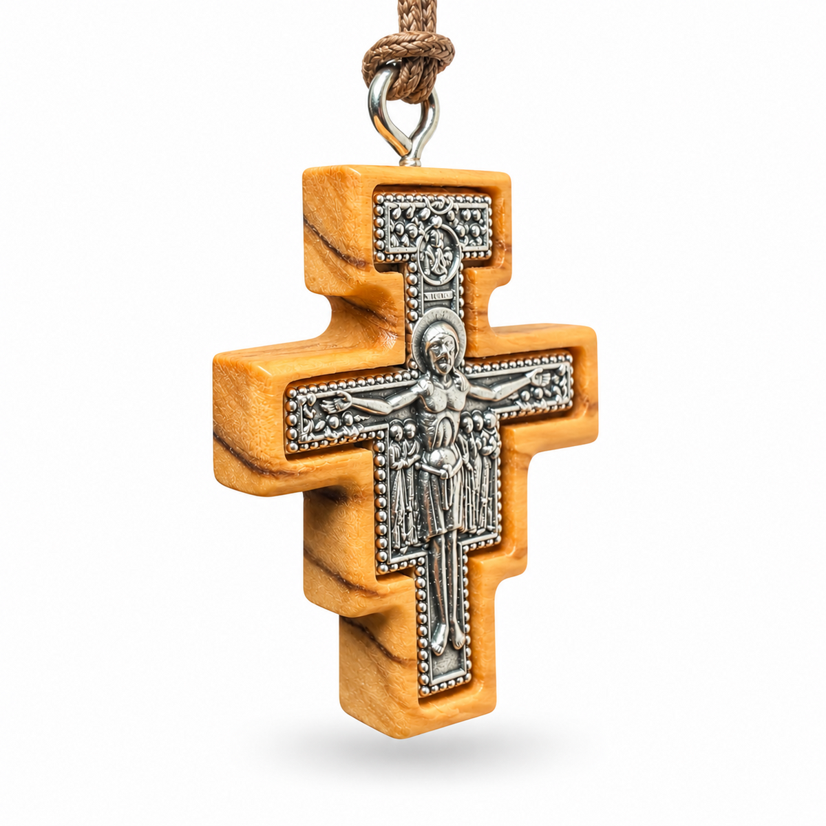 Large San Damiano olive wood crucifix necklace SCR81, angled view showing the metal inlay and wood thickness.