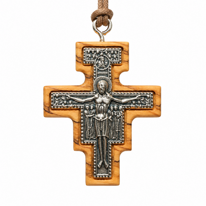 Large San Damiano olive wood crucifix necklace SCR81, front view with detailed metal inlay and brown cord.